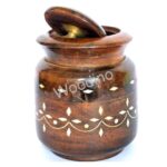 The Woodino Wooden 4 Inch Sugar Jar is a handcrafted, dark brown container with a polished finish, a decorative white floral band around the middle, and a lid slightly tilted open.